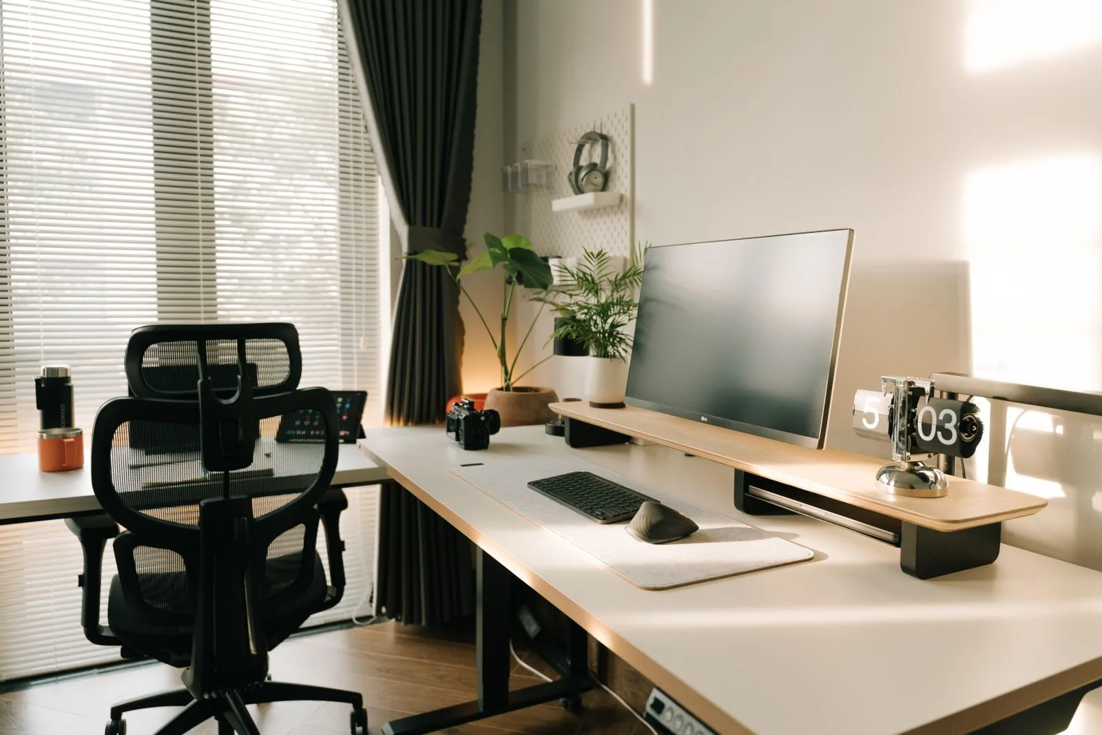 A naturally lit workspace with simple desk objects